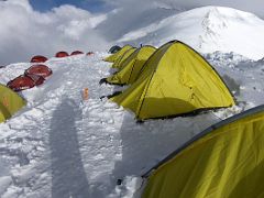 01C The tents at Ak-Sai Travel Lenin Peak Camp 3 6100m with the Lenin Peak summit ridge just beyond
